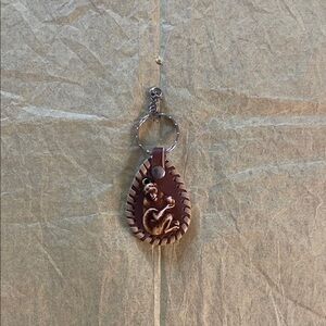 Brown Leather Keychain with Carved Design